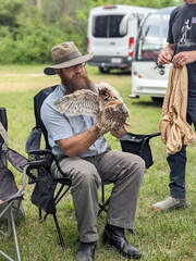 Dr. Blake Mathys with fledging barn owls during banding